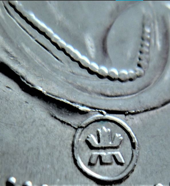 10 Cents 2008-Coin fendillé au dessus du logo-3.JPG