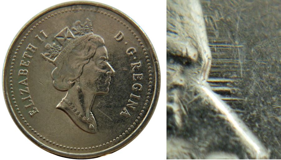 5 Cents 1994-Dommage du coin devant les yeux-2.JPG