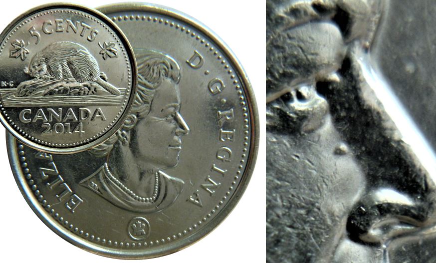 5 Cents 2014-Éclat coin sous l'oeil de effigie-1.JPG
