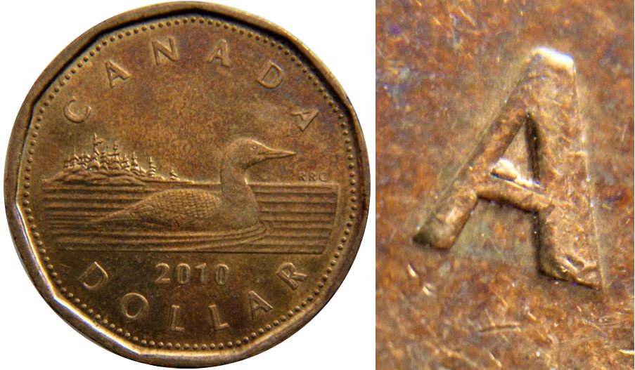 1 Dollar 2010-Éclat coin dans le A de canAda-1.JPG