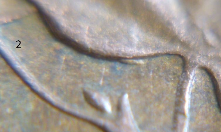 1 Cent - 1970- Défaut de coin sous feuille gauche-3b.JPG