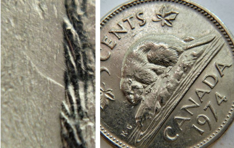 5 Cents 1974-Coin entrechoqué tête du castor-1.JPG