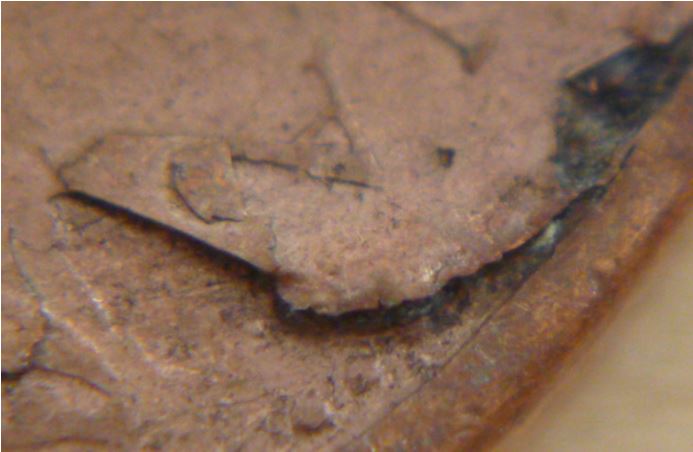 1 Cent 1969-Défaut de flan avers-3.JPG