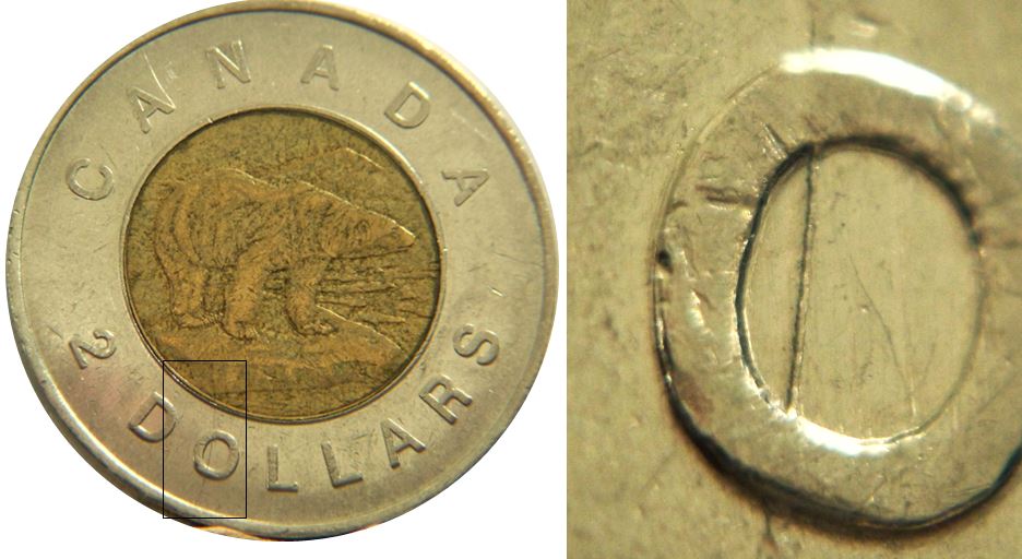 2 Dollars 1996-Coin fendillé à travers O de dOllar-1.JPG