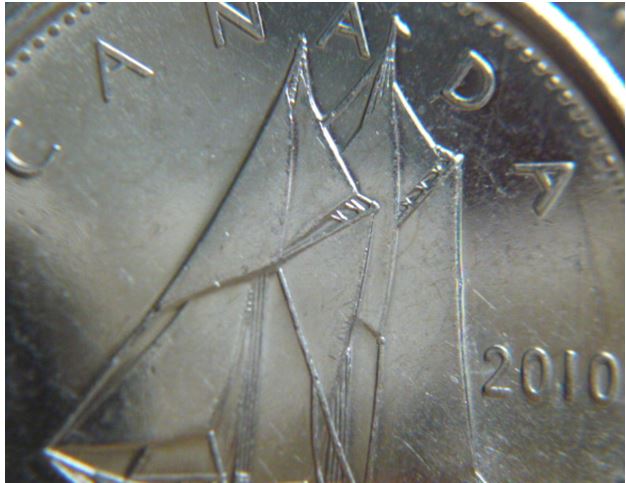 10 Cents 2010-Dommage de coin-3.JPG