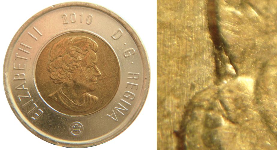 2 Dollars 2010-Éclat coin derrière les cheveux-1,.JPG