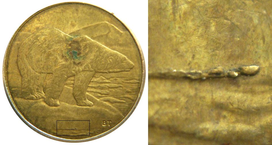 2 Dollars 2014-Éclat coin sous la glace-1.JPG