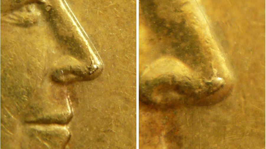 1 Dollar 2018-Éclat coin au bout du nez-No2.JPG