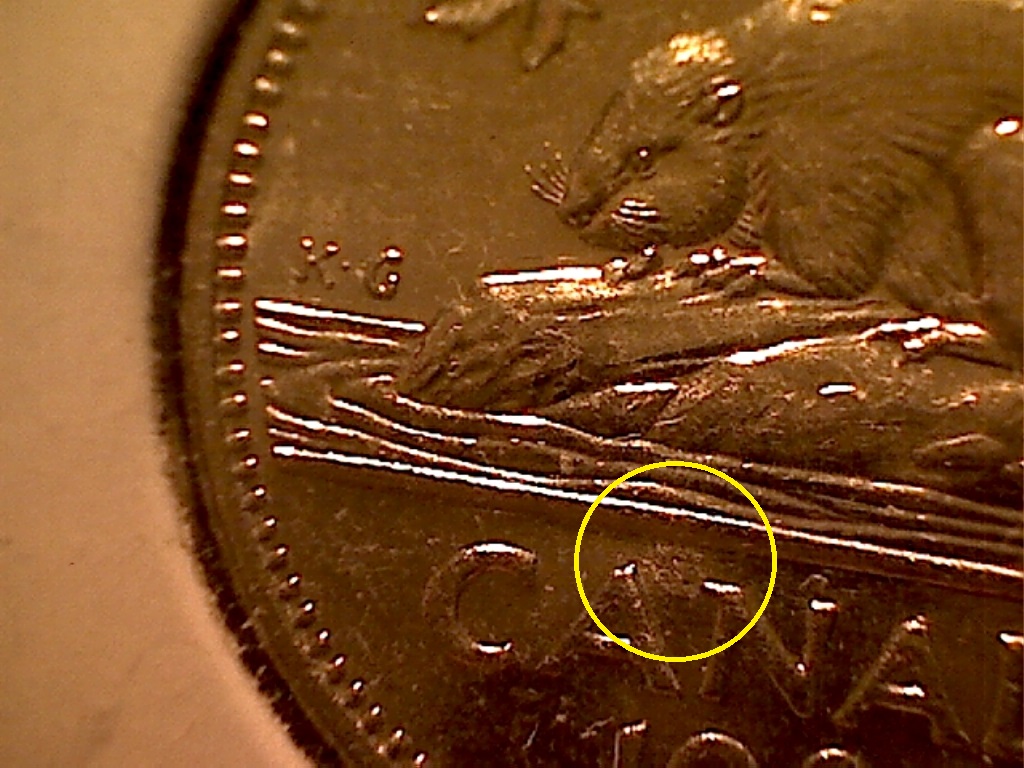 5 Cents 1980 Frapp. ds. gai. au-dessus N de CAN B524062D.jpg