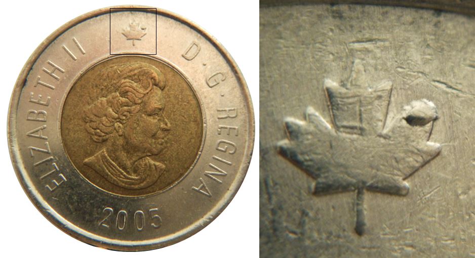 2 Dollars 2005-Éclat coin sur la feuille-1.JPG
