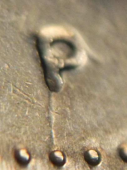 25 Cents 2001-Coin fendillé Apprès P -2.JPG