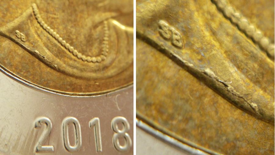 2 Dollars 2018-Coin fendille à la base de effigie-1.JPG