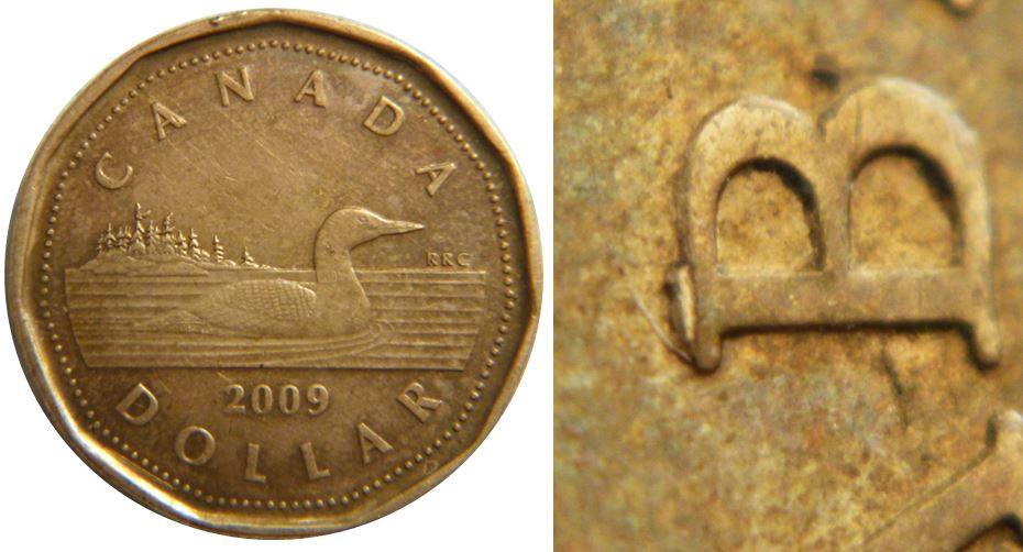 1 Dollars 2009-Éclat coin sur B de elizaBeth-1,.JPG