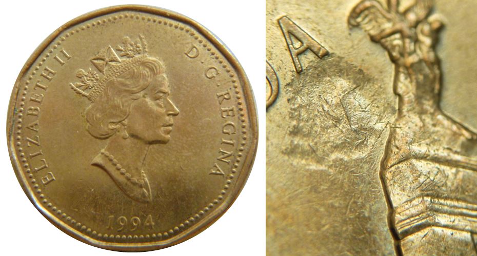 1 Dollar 1994-Frappe a travers coté revers-1.JPG