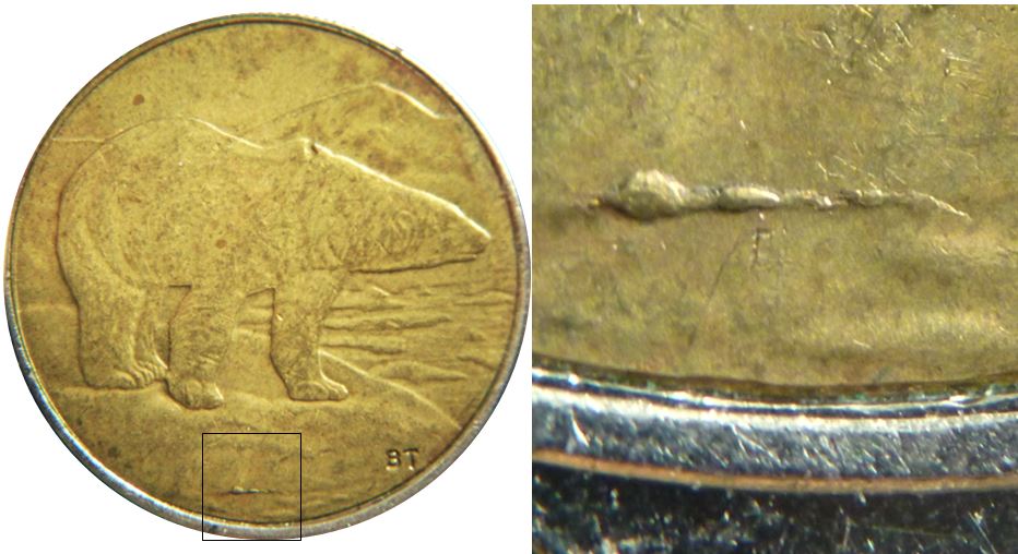 2 Dollars 2013-Éclat coin sous la glace-1.JPG