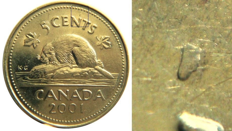 5 Cents 2001-Éclat coin tête N de ceNts-1,.JPG