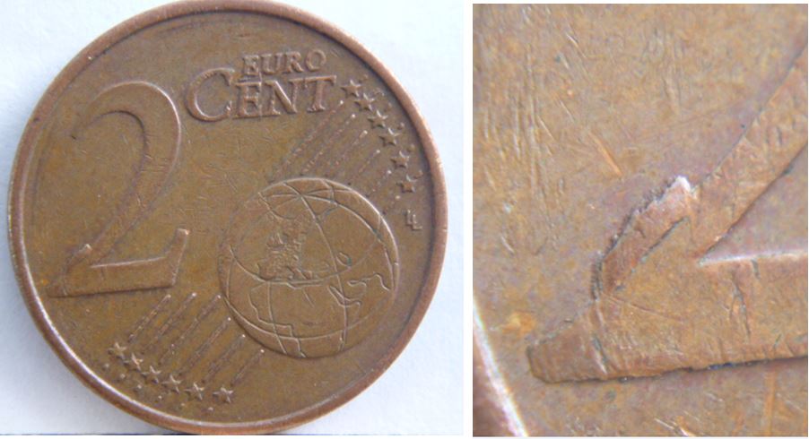 2 Euro Cent 1999- Éclat de coin sur le 2.JPG