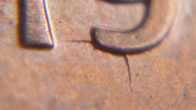 1 Cent 1998-Coin fendillé a 2 endroit au bout du premier 9-1.JPG